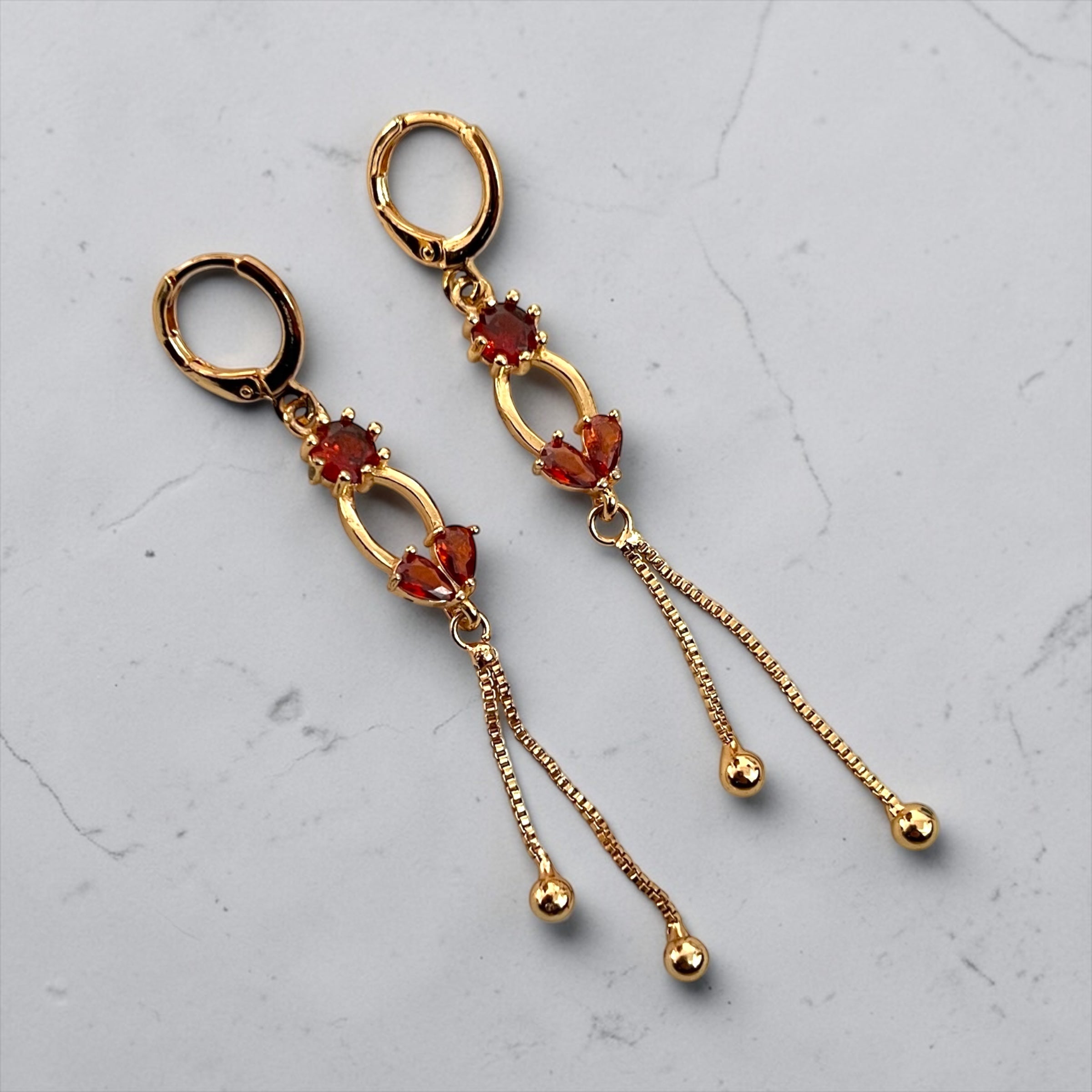 Gold-Plated Drop Earrings with Red Crystal
