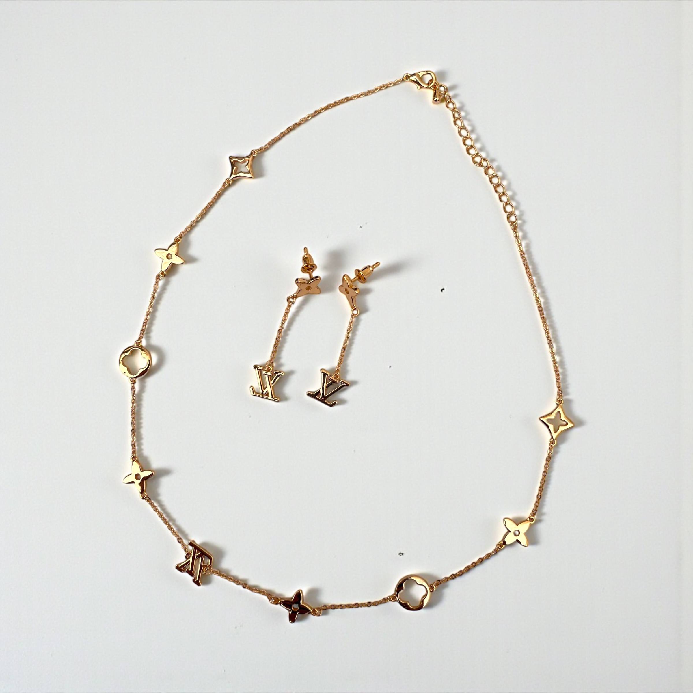 طقم قلادة وأقراط متدلية من لويس فويتون - رقيق وأيقوني ✨