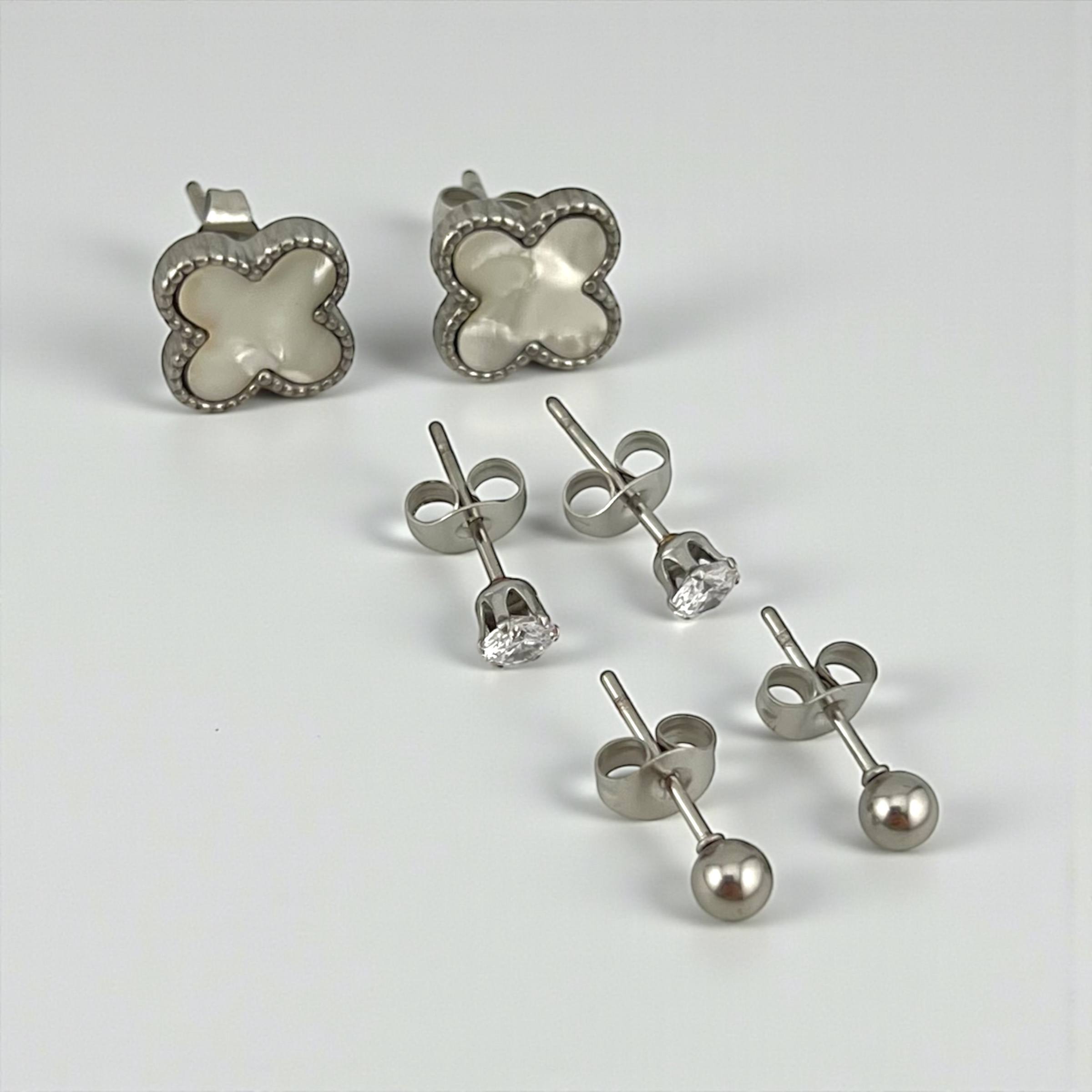 ✨ مجموعة أقراط ثلاثية فضية