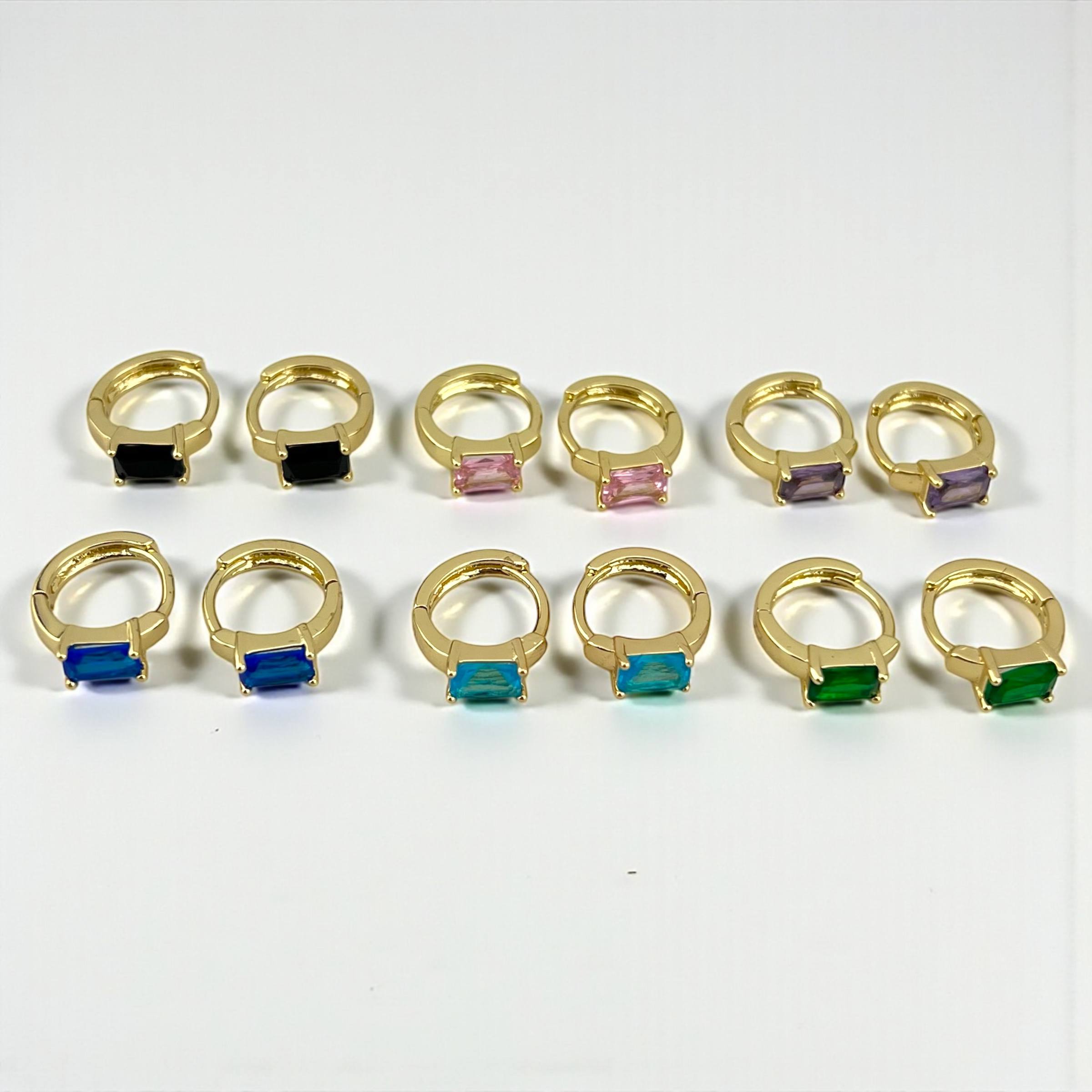 أقراط دائرية متوهجة من الأحجار الكريمة